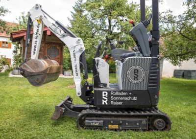 Beschriftung Bagger Rollladen und Sonnenschutz Reiser Wasserburg